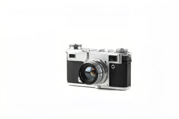 istock Old vintage rangefinder film camera on white background. 1408011838