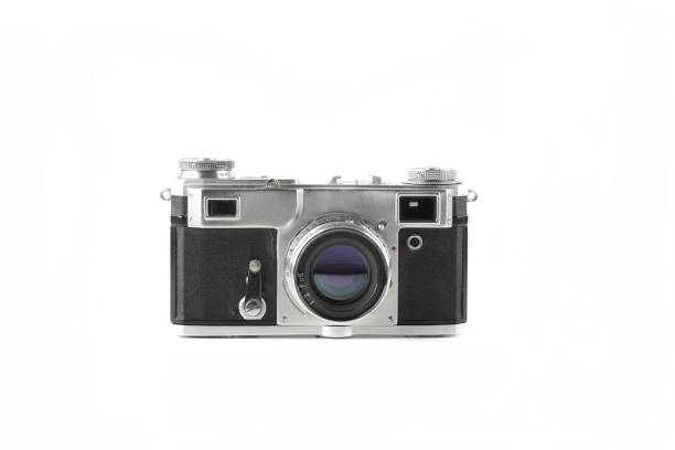 Old vintage rangefinder film camera on white background.