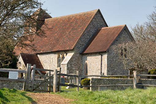 East Dean, England , Mar 24, 2022: St Simon & St Jude's Church, East Dean, Eastbourne, UK.