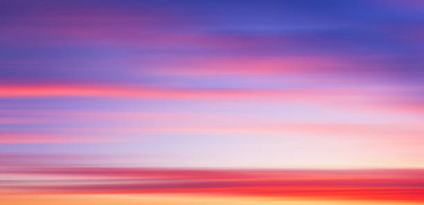 istock Colorful cloudy sky at sunset. Gradient color. Sky blur texture, abstract nature background motiom blur. 1408015516