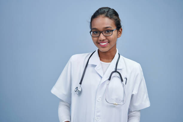 istock confident hijab doctor with lab coat against gray background 1408017040