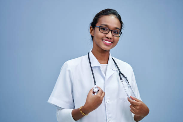 istock confident hijab doctor with lab coat against gray background 1408017086
