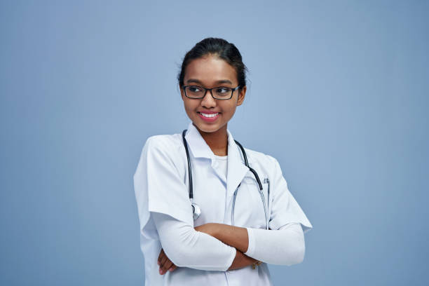 istock confident hijab doctor with lab coat against gray background 1408017180