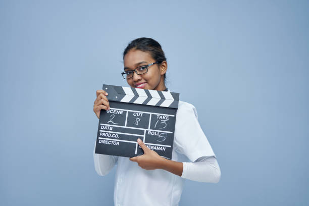 young doctor with clapper board work life balance