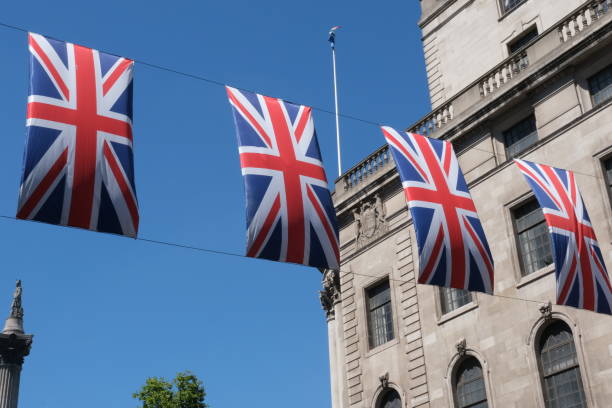 istock British flags hanging on the streets of London. Union jack flag triangular outside decoration 1408018698
