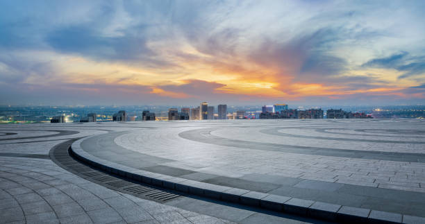istock Empty floor and city skyline at sunset 1408021067