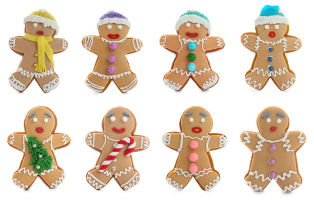 istock Set with decorated gingerbread men on white background. Delicious Christmas cookies 1408022367