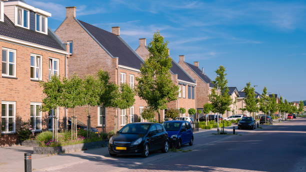 Dutch Suburban area with modern family houses, newly build modern family homes in the Netherlands stock photo