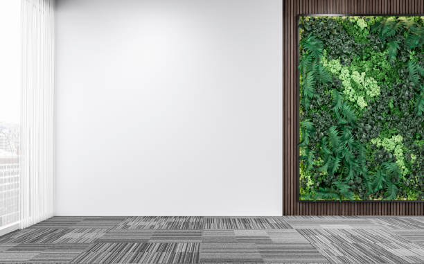 istock Empty unfurnished office interior with a vertical garden, partly hardwood background, partly white plaster wall, and large windows 1408022753
