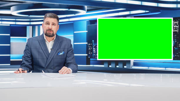 istock TV Talk Show Live News Program: Anchorman Presenter Reporting, Uses Green Screen Template. Television Cable Channel Anchorman Host Talks. Network Broadcast Newsroom Studio Mockup. 1408026209