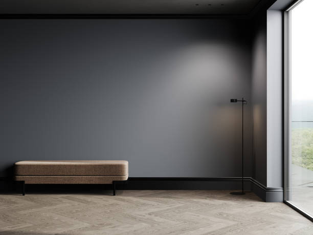 istock Dark grey empty wall mockup in modern interior design with beige pouf, 3d rendering 1408026419