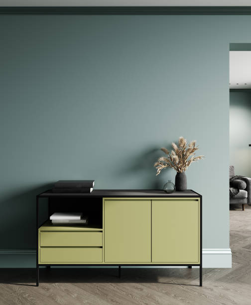 istock Cabinet mockup in modern empty room, green wall, 3d rendering 1408026436