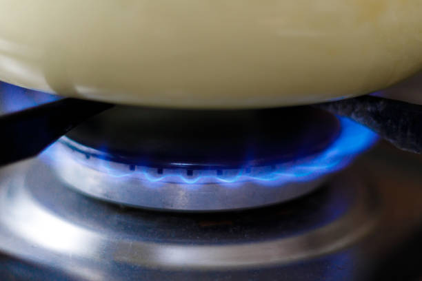 istock Blue burning gas in the home kitchen, cooking stove. 1408027708