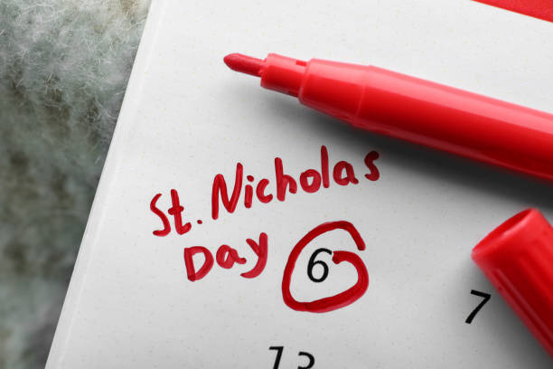 istock Saint Nicholas Day. Calendar with marked date December 06 and marker, top view 1408029456