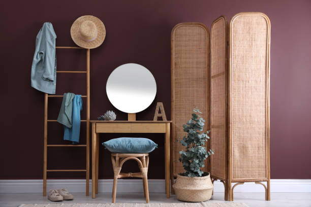 istock Stylish furniture, beautiful eucalyptus and decorative elements in room. Interior design 1408029504