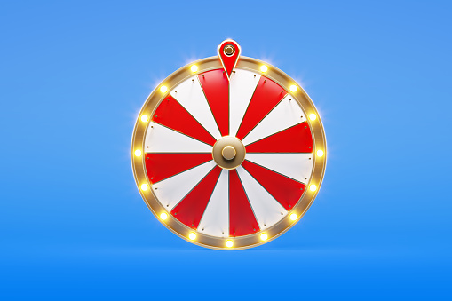 Wheel of fortune on blue background. Horizontal composition with copy space. Front view.