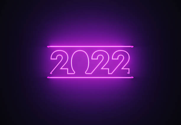 istock Purple Neon Light Writes 2022 on Black Background 1408030227