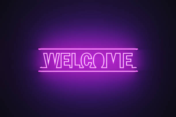 istock Purple Neon Light Writes Welcome on Black Background 1408030412