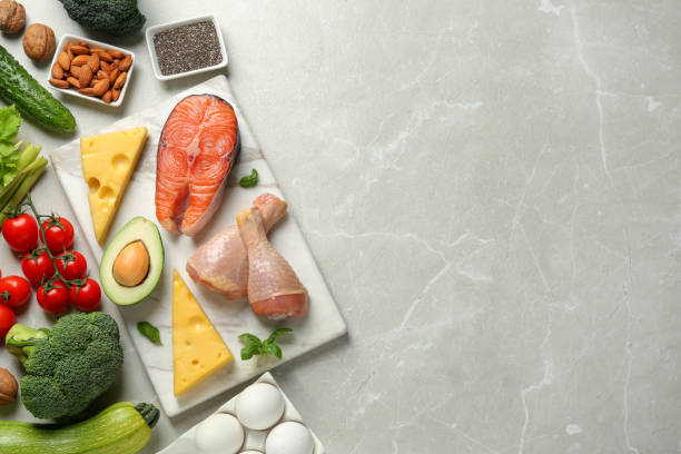 istock Flat lay composition with keto diet products on light grey marble table, space for text 1408034569
