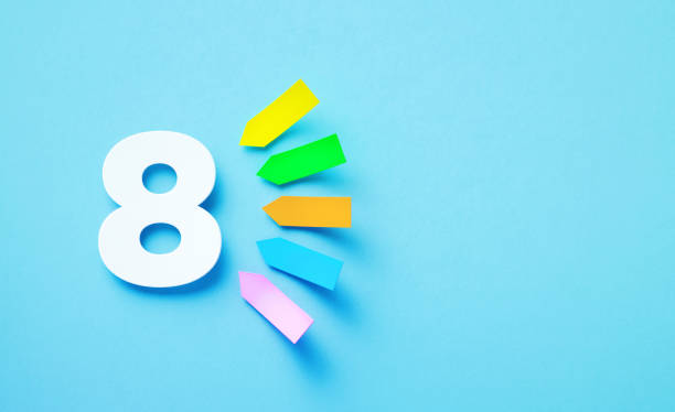 istock White Number 8 Sitting Next To Colorful Adhesive Notes Over Blue Background 1408034756