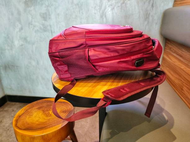 istock red bag on a wooden table 1408037423