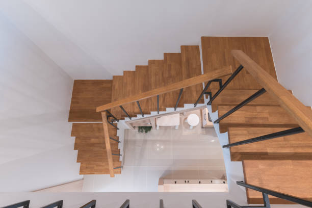 istock wooden modern stairs and railing 1408038908