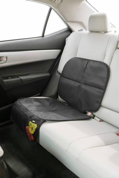 istock Simple black car seat protector for children, attached on a back seat 1408038956
