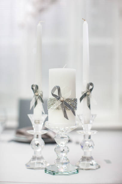 istock Decorated candles on glass candlesticks on a wedding table 1408042727