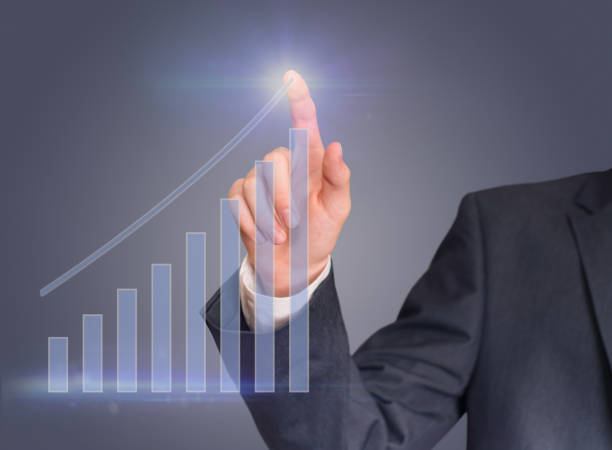 istock Business development success and growing concept. Businessman uses virtual interface pointing graph corporate future growth plan. 1408043319