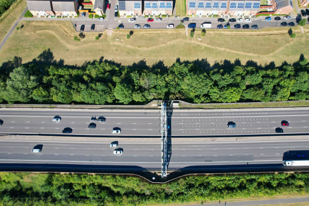 an aerial view of british motorways with traffic at luton town of england - escaping the rat race imagens e fotografias de stock