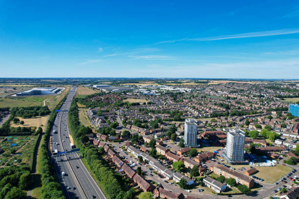 an aerial view of british motorways with traffic at luton town of england - escaping the rat race imagens e fotografias de stock