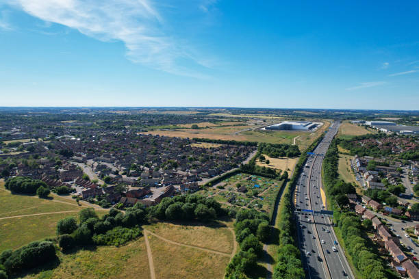 an aerial view of british motorways with traffic at luton town of england - escaping the rat race imagens e fotografias de stock