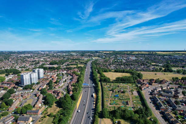 an aerial view of british motorways with traffic at luton town of england - escaping the rat race imagens e fotografias de stock