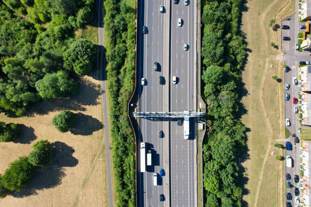 an aerial view of british motorways with traffic at luton town of england - escaping the rat race imagens e fotografias de stock