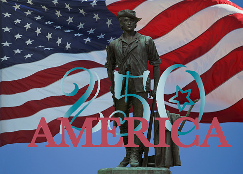 American 250th birthday, 4th of July, USA independence day celebration with Minuteman Statue and American flag.
