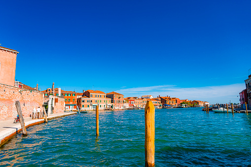 View of village and canal in Murano. Venice, Italy