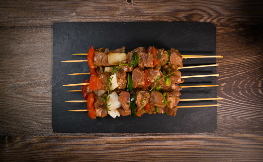 Tasty pork skewers, bbq meat on plate. High quality photo