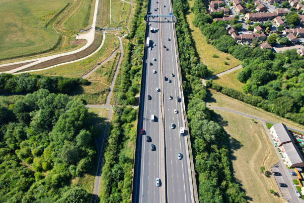 an aerial view of british motorways with traffic at luton town of england - escaping the rat race imagens e fotografias de stock