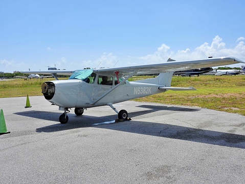 Pompano Beach, Broward County, Florida, USA July 4, 2022. A Cessna fixed wing single engine, 4 seats / 1 engine, N6382K parked at the Pompano Beach Airpark without a propeller.