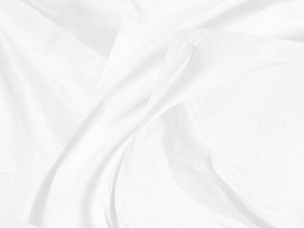 istock fashion textile white Clean woven beautiful soft fabric abstract smooth curve shape decorative background 1408050487