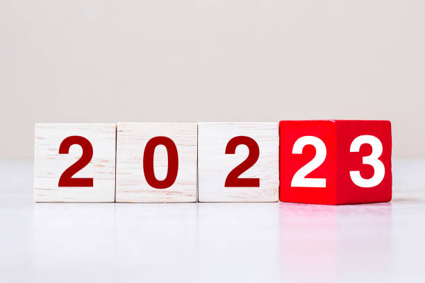 istock flipping block 2022 to 2023 text on table. Resolution, strategy, plan, goal, motivation, reboot, business and New Year holiday concepts 1408050502
