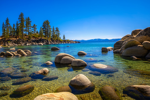 Sand Harbor Beach at Lake Tahoe, Nevada State Park, with Sierra Nevada Mountains in the background.