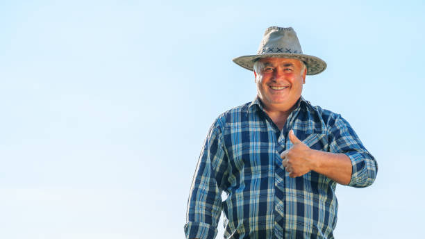 istock Delighted mature male worker looking at camera with thumb up gesture 1408053691