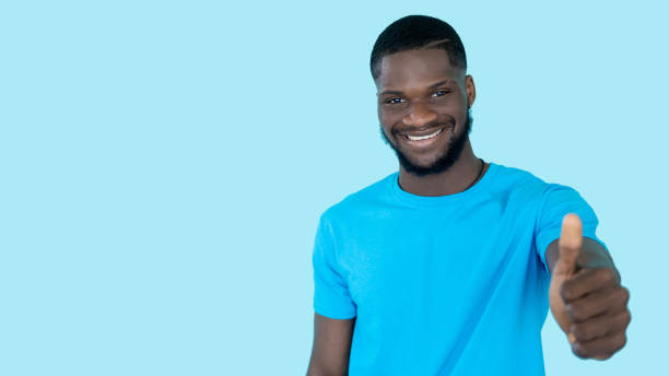 istock like gesture positive feedback happy man thumbs up 1408053853