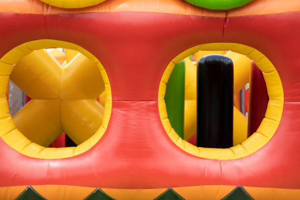 istock Inflated obstacle course. Rubber trampoline. Entertainment area in summer. 1408054823