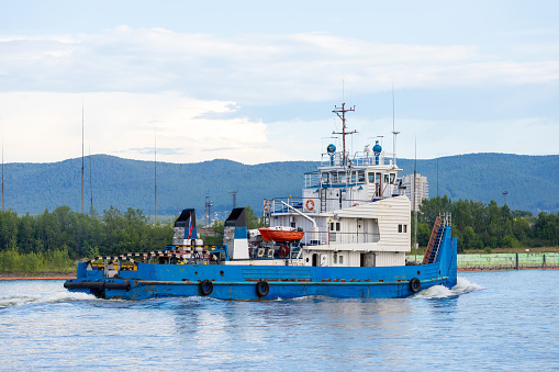 Tugboat for barge on Yenisei river in Krasnoyarsk, Russia