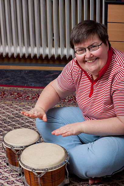 istock mentally disabled woman with drums 140805935