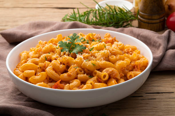 istock Stir fried macaroni with tomatoes sauce 1408059516