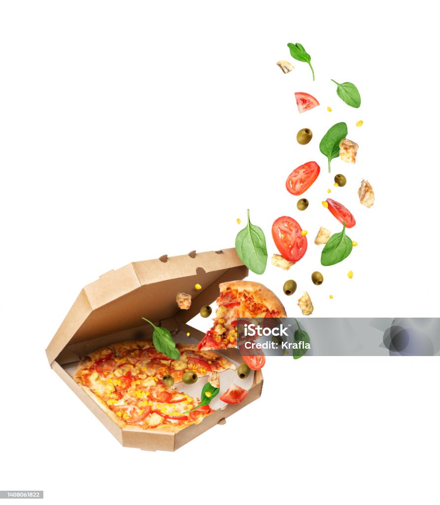 Freshly baked pizza with chicken meat and ingredients in the air Pizza Stock Photo