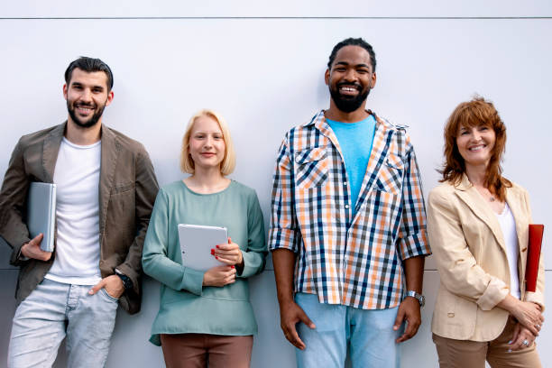 istock Smiling diverse People with portable gadgets 1408062294